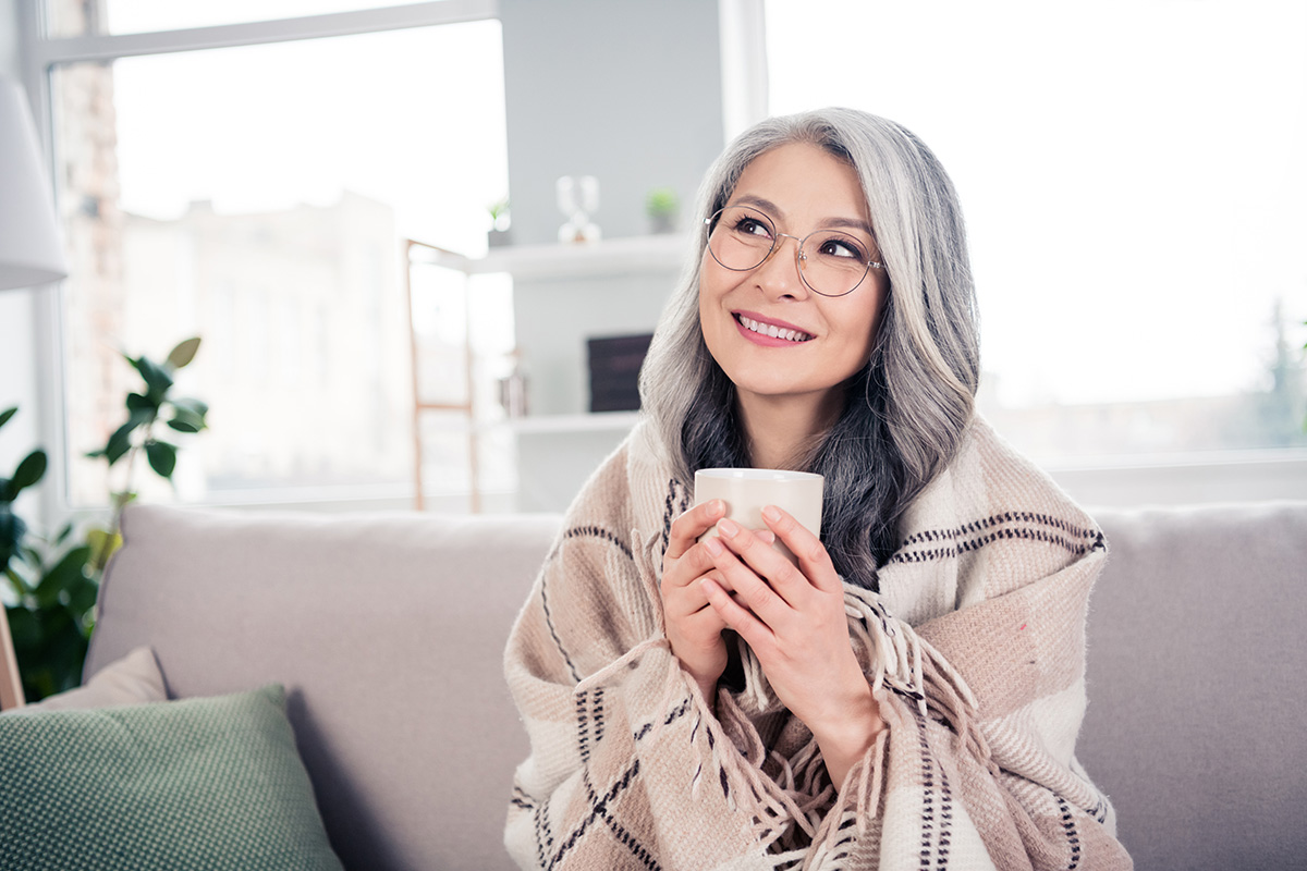 Chinese American senior woman smiling warmly